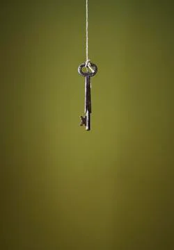 Key hanging on string Stock Photos