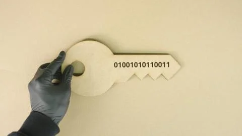 Key icon with printed binary code Stock Photos