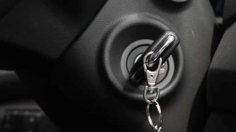 Key in the ignition close-up. Man drives a car Stock Footage 138249339