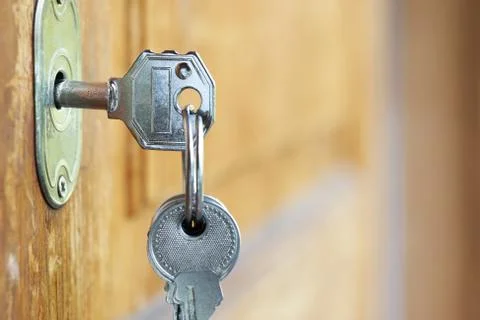 Key inserted in a key hole outdoors Fotos de archivo