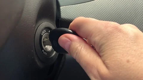 Key inserted into the lock of ignition of the car. Stock Footage 244719559