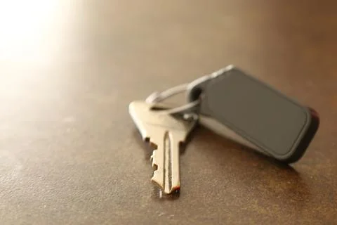 Key with keychain on the table Stock Photos
