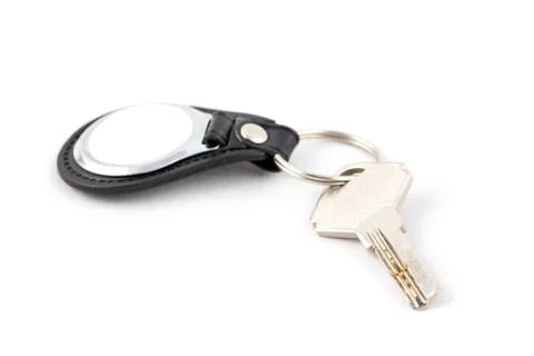 Key with keychain on white Stock Photos