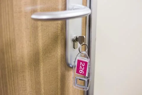 Key in keyhole on door Stock Photos