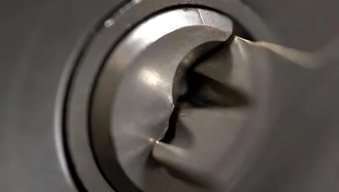 The key is in the keyhole. Stock Photos