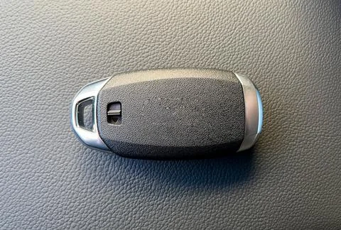 The key with keyless access to the car is black Stock Photos