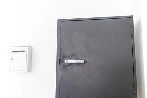 Key lock box with pin code mounted on hotel lobby wall Thailand. Stock Photos