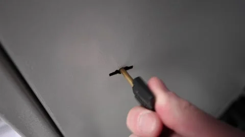 Key in the lock. Hand turns the key in the lock to open the door. Stock Footage 303185074