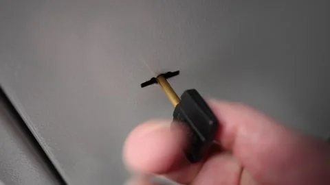 Key in the lock. Hand turns the key in the lock to open the door. Stock-Footage 303185081