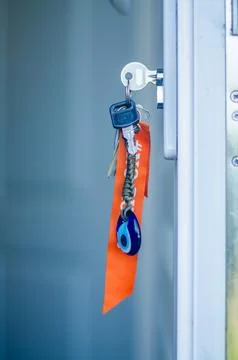 Key lock with key on the door Stock Photos