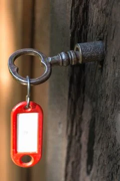 Key in lock with keyring Stock Photos