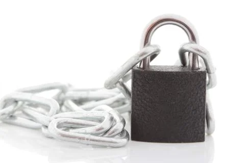 Key lock locked with a chain Stock Photos