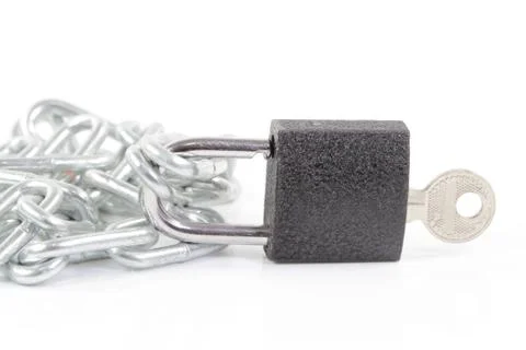 Key lock locked with a chain Stock Photos