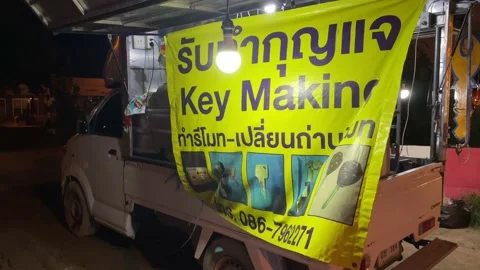 Key making sign beside mini truck locksmith service. Hua Hin, Thailand Stock Footage 225117911