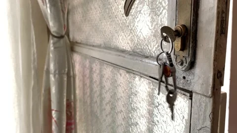 Key moving on a door nob. Stock Footage 163283018