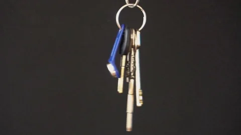 Key to a new home black background.slow motion Vídeo Stock 77080382
