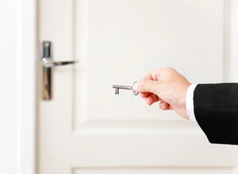 The key to open a door Stock Photos