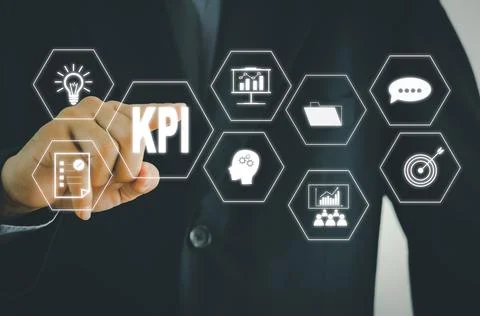 Key Performance Indicator KPI.businessman touch icon digital screen interface Stock Photos