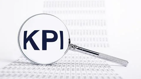 Key performance indicators. Magnifier with KPI letters and documents with 스톡 사진