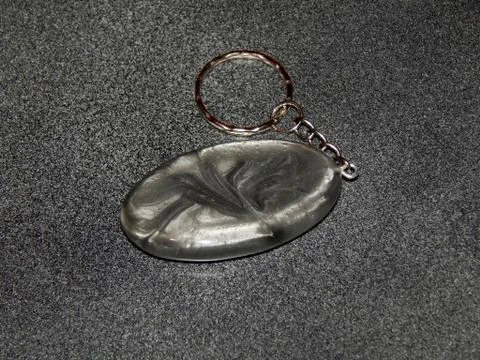 Key ring with epoxy resin close up Stock Photos