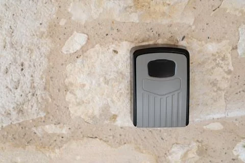 A key safe fitted to a stone wall Stock Photos