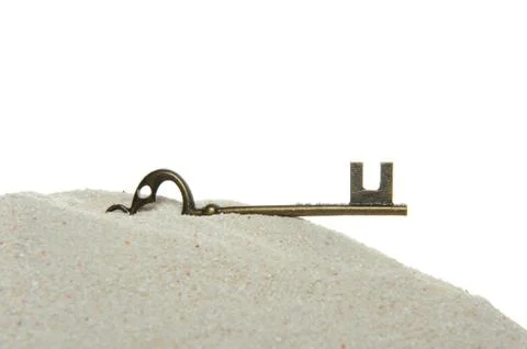 Key on sand Stock Photos