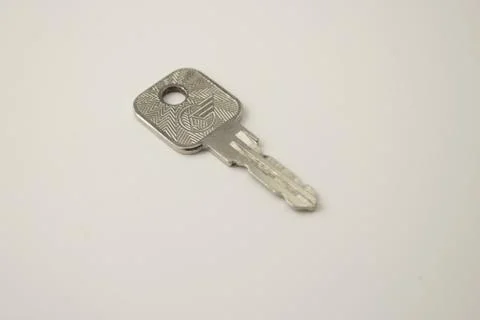 The key is silver on a white background Stock Photos