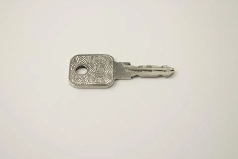 The key is silver on a white background Stock Photos