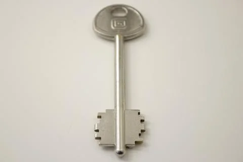 The key is silver on a white background Stock Photos