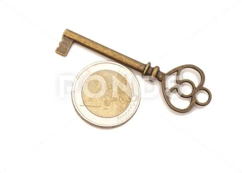 Key to success and euro coin isolated on white Stock Photos