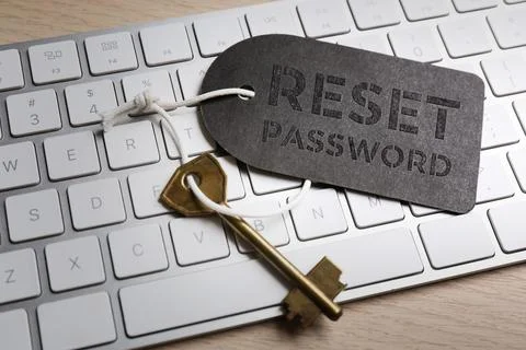 Key with tag RESET PASSWORD on keyboard, closeup Stock Photos