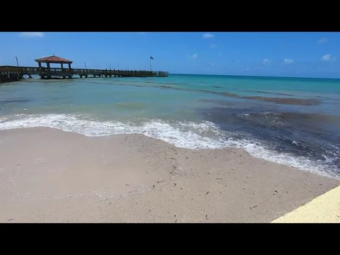 Key West ocean video, Static camera, about a minute of waves on a beach. Stock Footage 296297070
