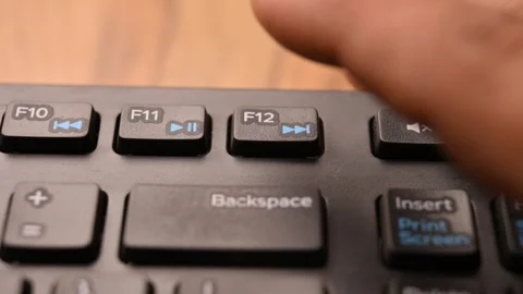 Keyboard Action of Man Using F12 Key to Access Developer Tools on Computer Stock Footage 333576565
