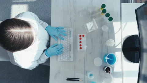 Keyboard and computer screen in the focus of a video clip demonstrating data Stock Footage 240329285