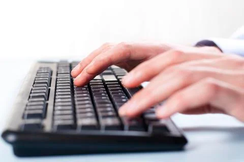 Keyboard and hand Stock Photos