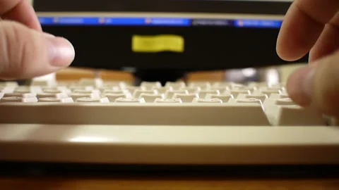 Keyboard and a man typing on it Stock Footage 234795854