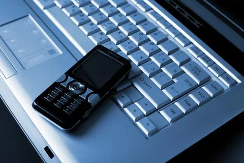 Keyboard and mobile phone background Stock Photos