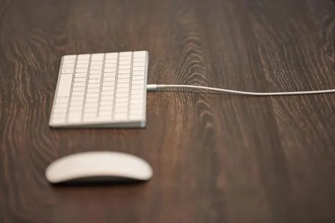 Keyboard and mouse on office table. Modern minimal workplace for study. Empty Stock Photos