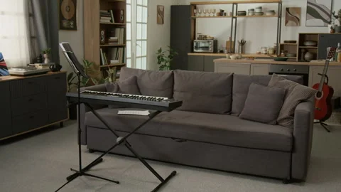 Keyboard and Music Stand in Studio Apartment Interior Stock Footage 333417101