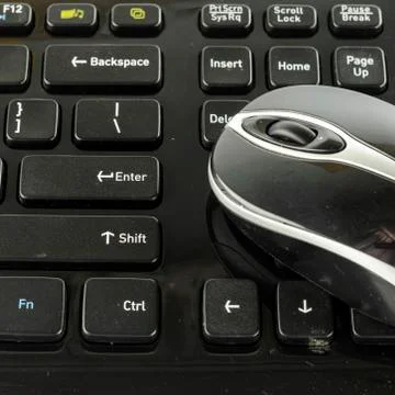 Keyboard and wireless mouse Stock Photos