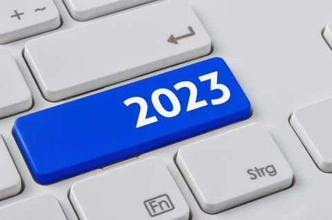 A keyboard with a blue button - 2023 스톡 사진