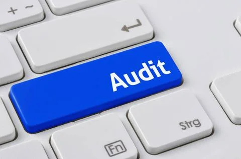 A keyboard with a blue button - Audit A keyboard with a blue button - Audi... 스톡 사진