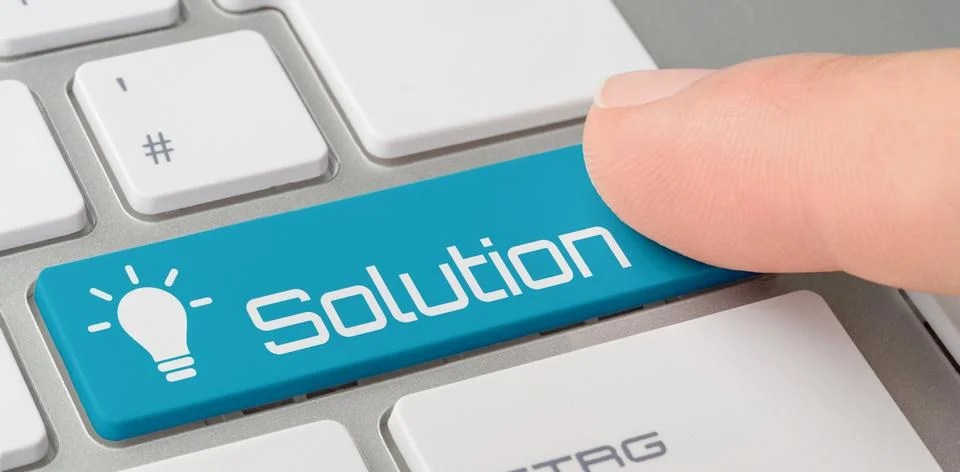 A keyboard with a blue labeled button - Solution Photos