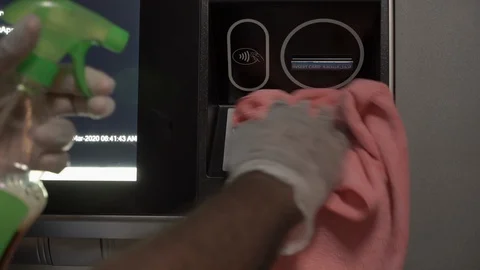 Keyboard cleaning atm machine . Stock Footage 128840810