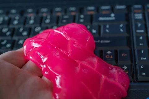 Keyboard cleaning gel in work. Stock Photos