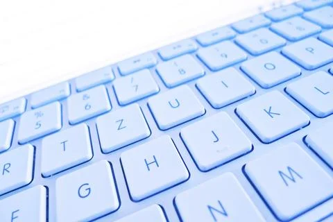 The keyboard of a computer in front of a screen. Data processing and Internet Foto stock