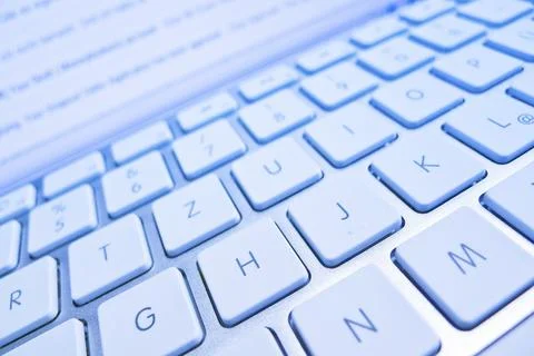 The keyboard of a computer in front of a screen. Data processing and Internet 스톡 사진