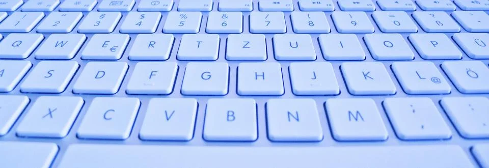 The keyboard of a computer in front of a screen. Data processing and Internet 写真素材