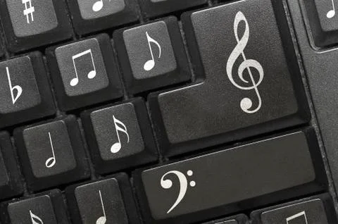 The keyboard of a computer with notes. 스톡 사진