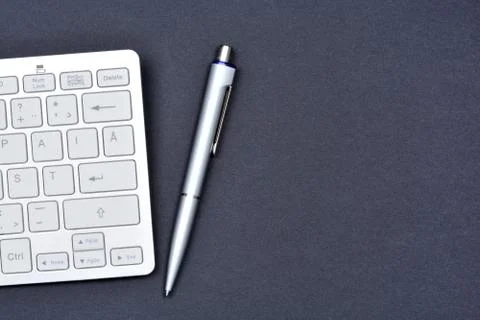 Keyboard computer with pen. Space writing Stock Photos